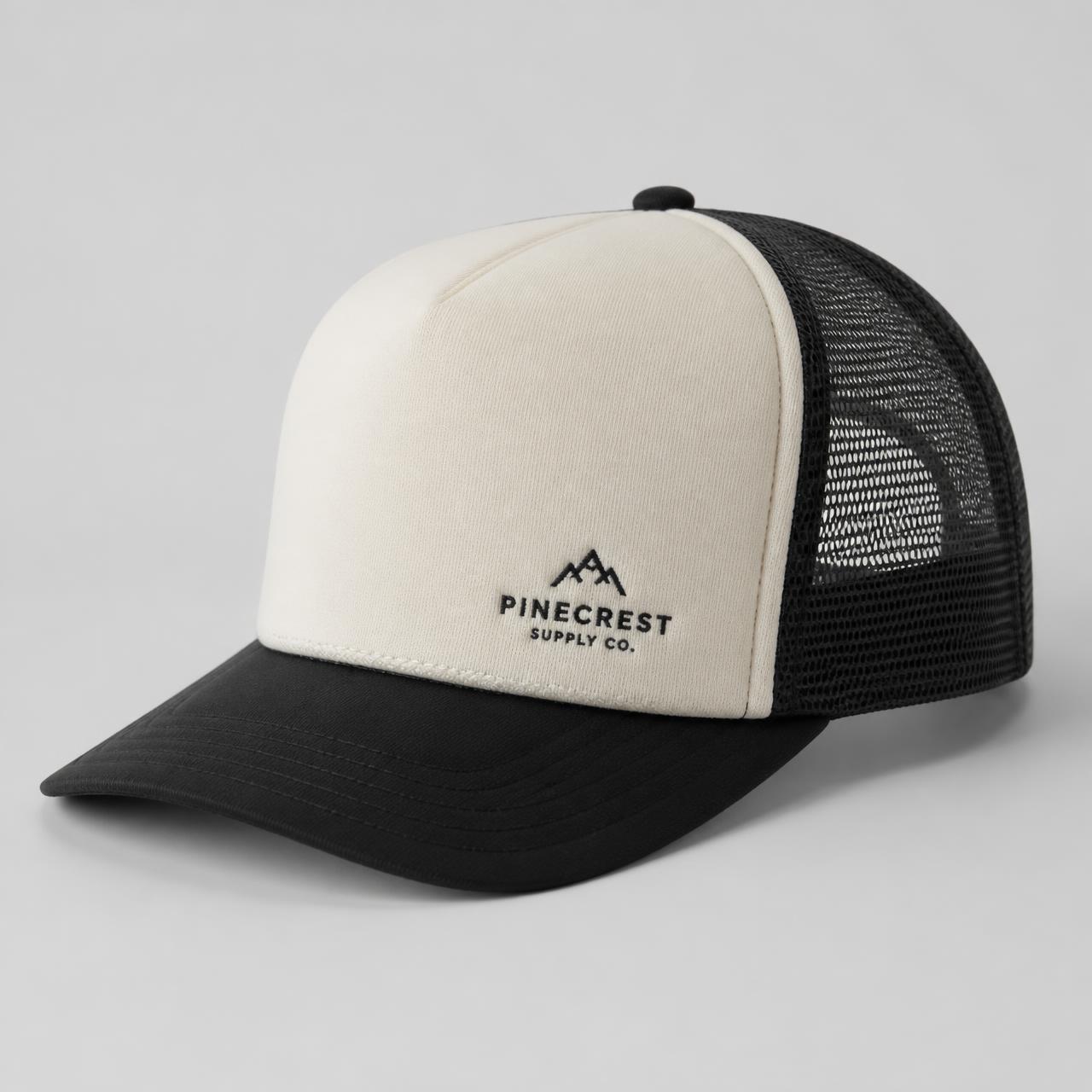 Custom structured mesh-back trucker hat with an embroidered brand logo